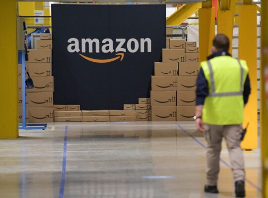 A man works in an Amazon warehouse