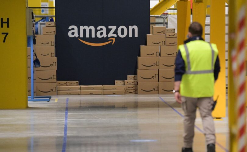 A man works in an Amazon warehouse